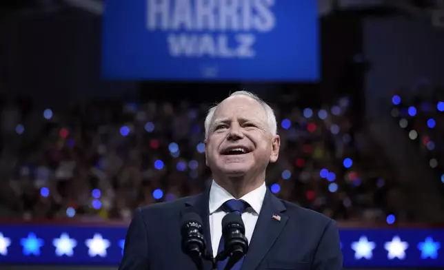 Democratic vice presidential nominee Minnesota Gov. Tim Walz appears with Democratic presidential nominee Vice President Kamala Harris at a campaign rally in Philadelphia, Tuesday, Aug. 6, 2024. (AP Photo/Matt Rourke)