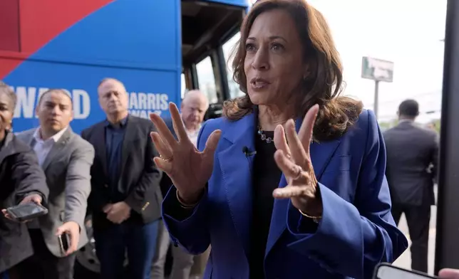 Democratic presidential nominee Vice President Kamala Harris speaks to reporters outside Primanti Bros. Restaurant during a campaign stop, Sunday, Aug. 18, 2024, in Pittsburgh. (AP Photo/Julia Nikhinson)