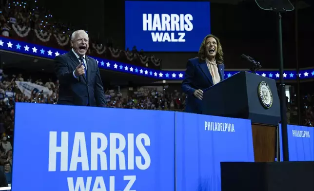 Democratic presidential nominee Vice President Kamala Harris and her running mate Minnesota Gov. Tim Walz speak at a campaign rally in Philadelphia, Tuesday, Aug. 6, 2024. (AP Photo/Matt Rourke)