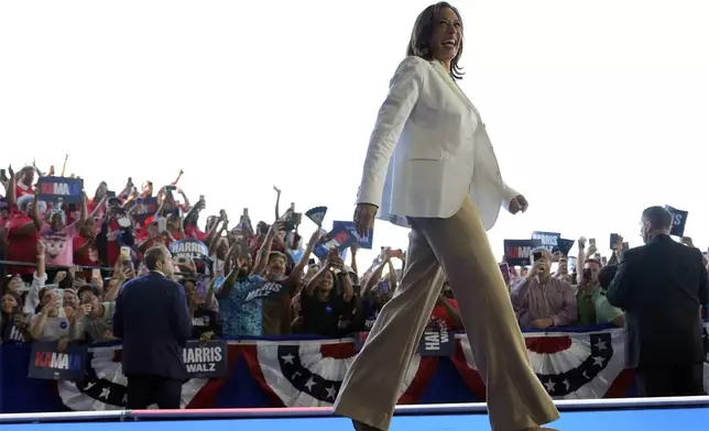 Democratic presidential nominee Vice President Kamala Harris arrives at a campaign rally Wednesday, Aug. 7, 2024, in Romulus, Mich. (AP Photo/Julia Nikhinson)