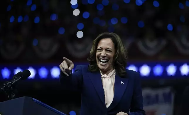 Democratic presidential nominee Vice President Kamala Harris and her running mate Minnesota Gov. Tim Walz speak at a campaign rally in Philadelphia, Tuesday, Aug. 6, 2024. (AP Photo/Matt Rourke)