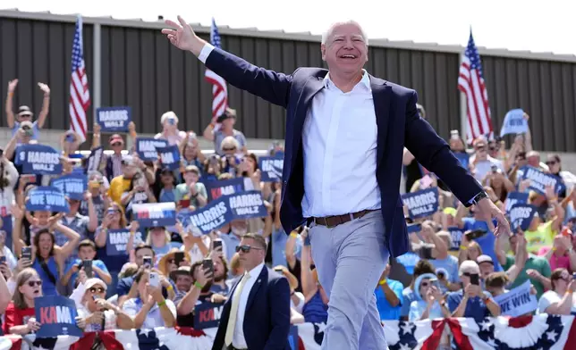 Democratic vice presidential candidate Minnesota Gov. Tim Walz arrives at a campaign rally Wednesday, Aug. 7, 2024, in Eau Claire, Wis. (AP Photo/Julia Nikhinson)