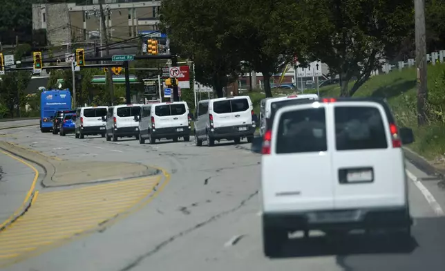 A bus with Democratic presidential nominee Vice President Kamala Harrison on board departs Pittsburgh International Airport, Sunday, Aug. 18, 2024, in Pittsburgh. (AP Photo/Julia Nikhinson)