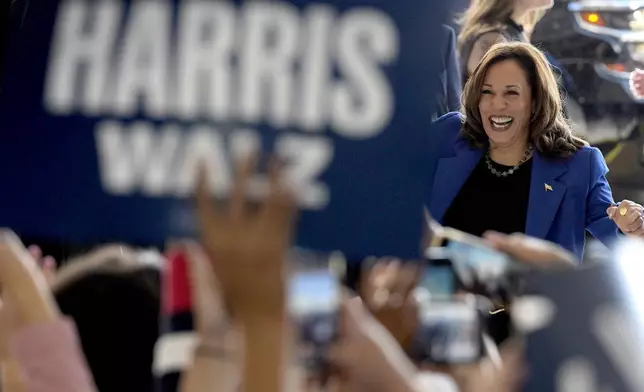 Democratic presidential nominee Vice President Kamala Harris arrives at Pittsburgh International Airport, Sunday, Aug. 18, 2024, in Pittsburgh. (AP Photo/Julia Nikhinson)