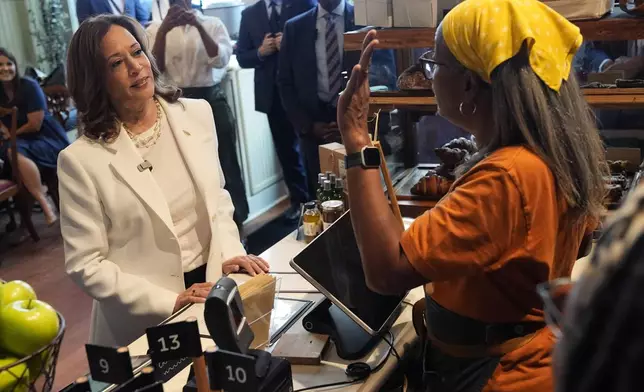 Democratic presidential nominee Vice President Kamala Harris listens during a stop at Dottie's Market in Savannah, Ga., Thursday, Aug. 29, 2024. (AP Photo/Jacquelyn Martin)