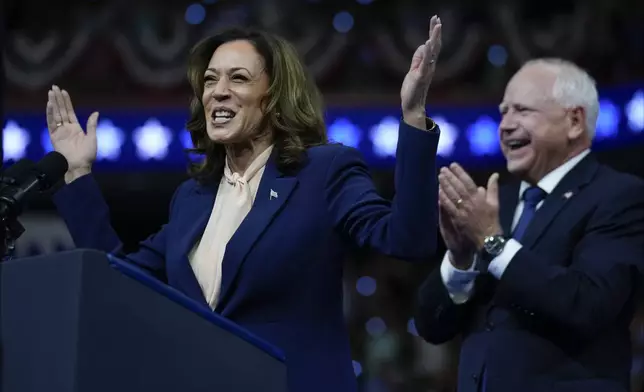 Democratic presidential nominee Vice President Kamala Harris and her running mate Minnesota Gov. Tim Walz speak at a campaign rally in Philadelphia, Tuesday, Aug. 6, 2024. (AP Photo/Matt Rourke)