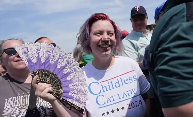 A supporter waits for Democratic presidential nominee Vice President Kamala Harris at a campaign rally Wednesday, Aug. 7, 2024, in Eau Claire, Wis. (AP Photo/Julia Nikhinson)