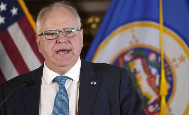 FILE - Minnesota Gov. Tim Walz speaks to the media, Nov. 9, 2022, in St. Paul, Minn. (AP Photo/Abbie Parr, File)