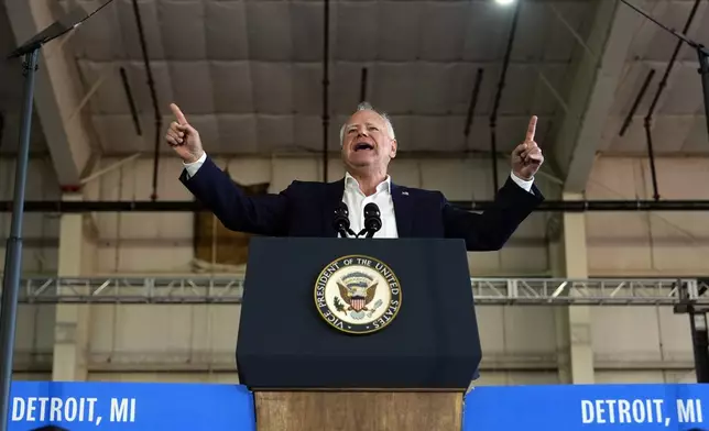 Democratic vice presidential candidate Minnesota Gov. Tim Walz speaks at a campaign rally Wednesday, Aug. 7, 2024, in Romulus, Mich., before Democratic presidential nominee Vice President Kamala Harris. (AP Photo/Julia Nikhinson)