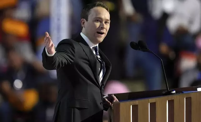 FILE - Cole Emhoff introduces his father second gentleman Douglas Emhoff during the Democratic National Convention, Aug. 20, 2024, in Chicago. (AP Photo/Paul Sancya, File)