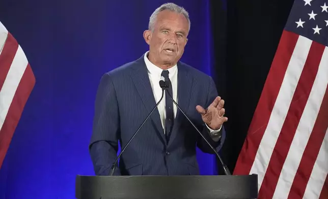 Independent presidential candidate Robert F. Kennedy Jr. announces he is suspending his presidential campaign at a news conference Friday, Aug 23, 2024, in Phoenix. (AP Photo/Darryl Webb)