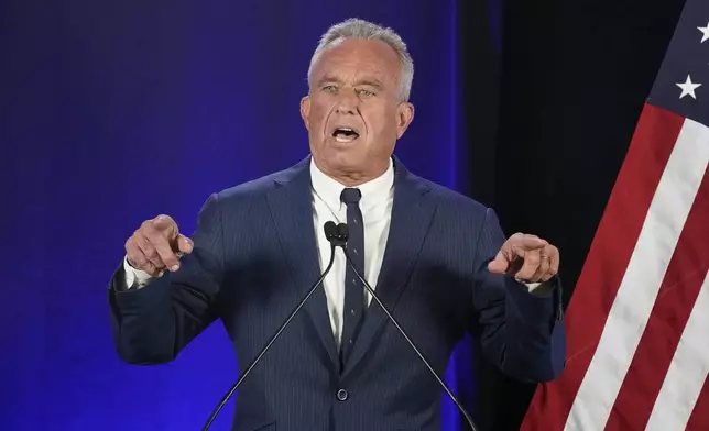 Independent presidential candidate Robert F. Kennedy Jr. announces he is suspending his presidential campaign at a news conference Friday, Aug 23, 2024, in Phoenix. (AP Photo/Darryl Webb)