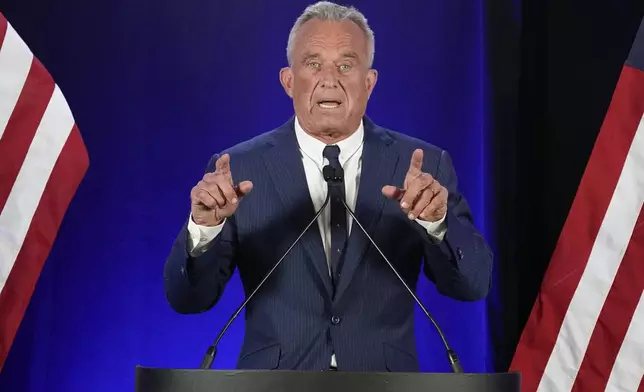 Independent presidential candidate Robert F. Kennedy Jr. announces he is suspending his presidential campaign at a news conference Friday, Aug 23, 2024, in Phoenix. (AP Photo/Darryl Webb)