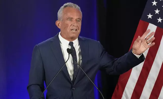 Independent presidential candidate Robert F. Kennedy Jr. announces he is suspending his presidential campaign at a news conference Friday, Aug 23, 2024, in Phoenix. (AP Photo/Darryl Webb)