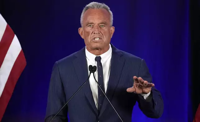 Independent presidential candidate Robert F. Kennedy Jr. announces he is suspending his presidential campaign at a news conference Friday, Aug 23, 2024, in Phoenix. (AP Photo/Darryl Webb)