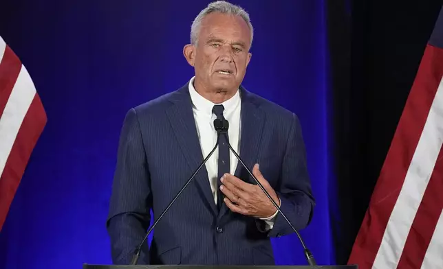 Independent presidential candidate Robert F. Kennedy Jr. announces he is suspending his presidential campaign at a news conference Friday, Aug 23, 2024, in Phoenix. (AP Photo/Darryl Webb)