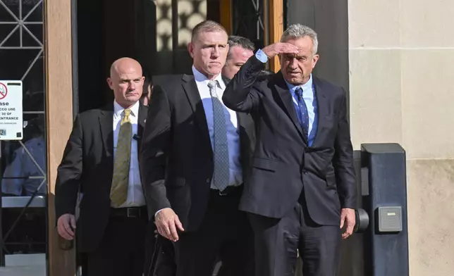 Independent presidential candidate Robert F. Kennedy Jr., leaves after giving testimony at the Albany County Courthouse, Wednesday, Aug. 7, 2024, in Albany, N.Y. Kennedy is fighting a lawsuit claiming he falsely claimed to live in New York as he sought to get on the ballot in the state. (AP Photo/Hans Pennink)