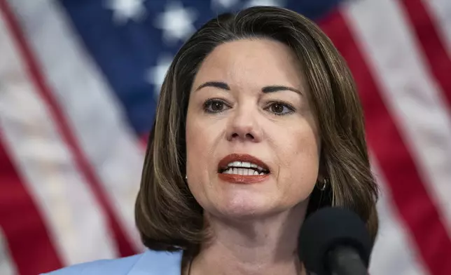 FILE - Rep. Angie Craig, D-Minn., speaks during a news conference on Capitol Hill on June 24, 2020, in Washington. (AP Photo/Manuel Balce Ceneta, File)