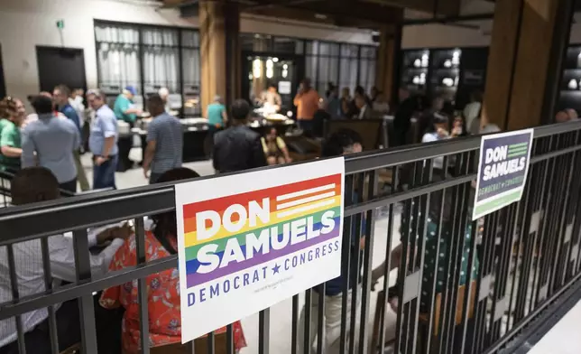 Guests mingle at an election night watch party for Don Samuels in Minneapolis, Tuesday, Aug. 13, 2024. (Ben Hovland/Minnesota Public Radio via AP)