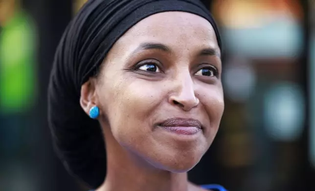 Rep. Ilhan Omar looks on during a campaign stop in Minneapolis, Tuesday, Aug. 13, 2024. (Kerem Yücel/Minnesota Public Radio via AP)