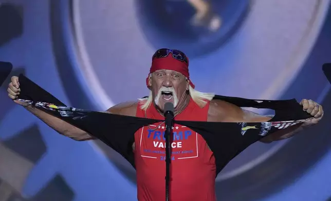 FILE - Hulk Hogan tears off his shirt while speaking on the final night of the Republican National Convention on Thursday, July 18, 2024, in Milwaukee. (AP Photo/J. Scott Applewhite, File)