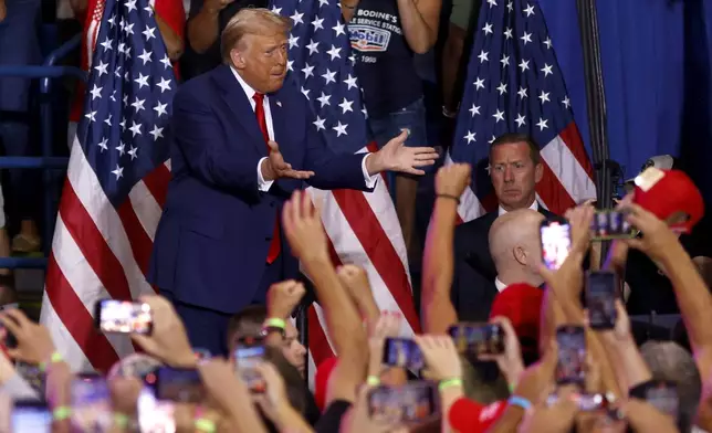 Republican presidential nominee former President Donald Trump arrives to speak at a campaign rally at the Mohegan Sun Arena at Casey Plaza in Wilkes-Barre, Pa., Saturday, Aug. 17, 2024. (AP Photo/Laurence Kesterson)