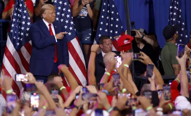 Republican presidential nominee former President Donald Trump arrives to speak at a campaign rally at the Mohegan Sun Arena at Casey Plaza in Wilkes-Barre, Pa., Saturday, Aug. 17, 2024. (AP Photo/Laurence Kesterson)