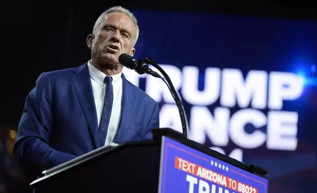 Independent presidential candidate Robert F. Kennedy Jr. speaks as he endorses Republican presidential nominee former President Donald Trump at a campaign rally at the Desert Diamond Arena, Friday, Aug. 23, 2024, in Glendale, Ariz. (AP Photo/Evan Vucci)