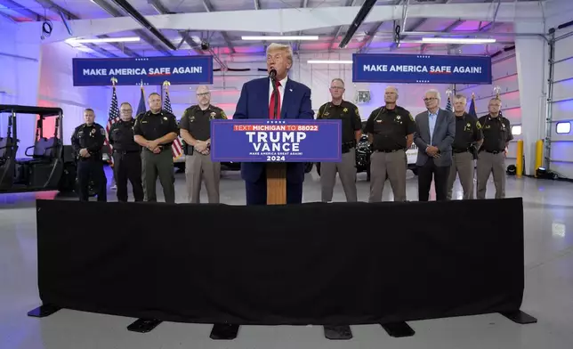 Republican presidential nominee former President Donald Trump speaks on crime and safety during a campaign event at the Livingston County Sheriff's Office, Tuesday, Aug. 20, 2024, in Howell, Mich. (AP Photo/Evan Vucci)