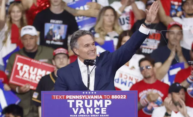 Dave McCormick, the Republican nominee for Senate in Pennsylvania, speaks at a campaign rally for Republican presidential nominee former President Donald Trump at the Mohegan Sun Arena at Casey Plaza in Wilkes-Barre, Pa., Saturday, Aug. 17, 2024. (AP Photo/Laurence Kesterson)