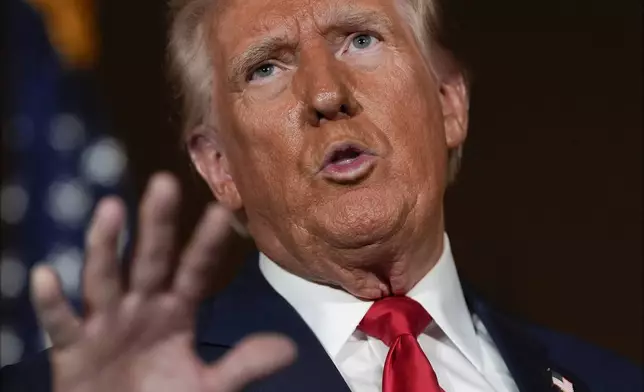 Republican presidential nominee former President Donald Trump talks with reporters at a campaign event at ll Toro E La Capra, Friday, Aug. 23, 2024, in Las Vegas. (AP Photo/Julia Nikhinson)