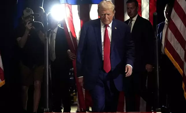 Republican presidential nominee former President Donald Trump arrives to speak at a campaign rally at the Mohegan Sun Arena at Casey Plaza, Saturday, Aug. 17, 2024, in Wilkes-Barre, Pa. (AP Photo/Carolyn Kaster)