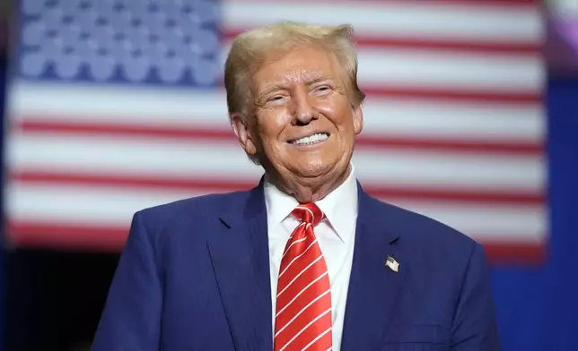 Republican presidential nominee former President Donald Trump smiles as he speaks at a campaign event, Friday, Aug. 30, 2024, in Johnstown, Pa. (AP Photo/Alex Brandon)