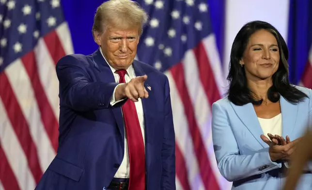 Republican presidential nominee former President Donald Trump gestures during a town hall with former Democratic Rep. Tulsi Gabbard, Thursday, Aug. 29, 2024, in La Crosse, Wis. (AP Photo/Charlie Neibergall)