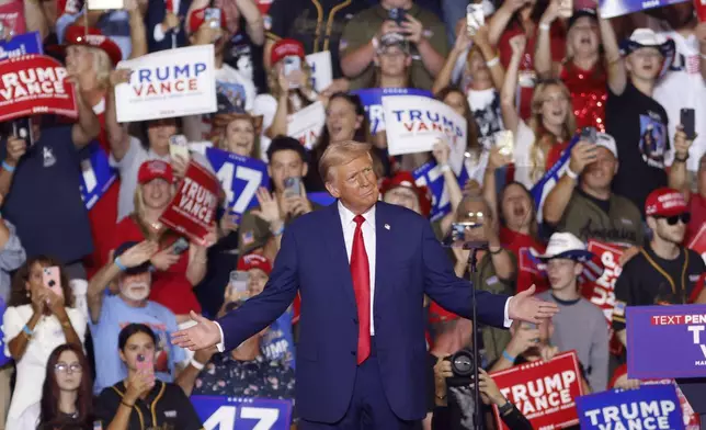 Republican presidential nominee former President Donald Trump arrives to speak at a campaign rally at the Mohegan Sun Arena at Casey Plaza in Wilkes-Barre, Pa., Saturday, Aug. 17, 2024. (AP Photo/Laurence Kesterson)