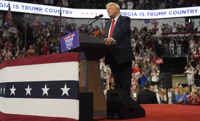 Republican presidential candidate former President Donald Trump speaks at a campaign rally at Georgia State University in Atlanta, Saturday, Aug. 3, 2024. (AP Photo/John Bazemore)