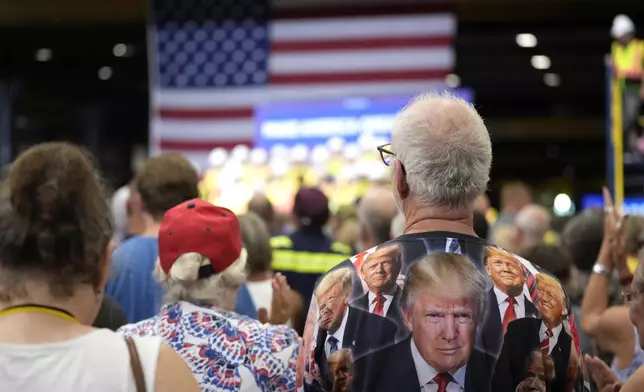 Supporters attend a campaign event for Republican presidential nominee former President Donald Trump at Alro Steel, Thursday, Aug. 29, 2024, in Potterville, Mich. (AP Photo/Alex Brandon)