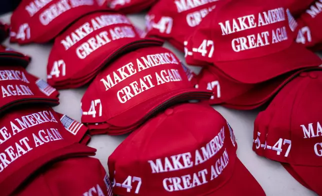 Merchandise is pictured before a campaign rally for Republican presidential nominee former President Donald Trump at the Mohegan Sun Arena at Casey Plaza in Wilkes-Barre, Pa., Saturday, Aug. 17, 2024. (AP Photo/Laurence Kesterson)