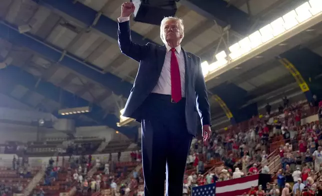 FILE - Republican presidential candidate former President Donald Trump gestures to the crowd after speaking at a campaign rally, July 31, 2024, in Harrisburg, Pa. Trump returns to Georgia on Saturday, Aug. 3, to hone in on Vice President Kamala Harris, his newly minted general election opponent, in a state that both major parties now see as up for grabs, yet again. (AP Photo/Alex Brandon, File)