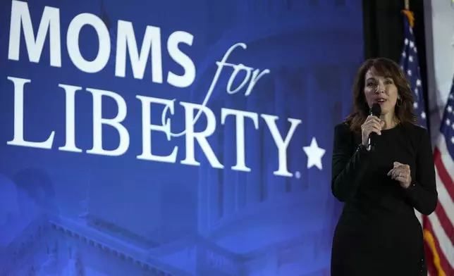 Moms for Liberty co-founder Tina Descovich speaks before Republican presidential nominee former President Donald Trump at the Moms for Liberty annual convention in Washington, Friday, Aug. 30, 2024. (AP Photo/Mark Schiefelbein)