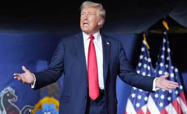 FILE - Republican presidential candidate former President Donald Trump arrives to speak at a campaign rally, July 31, 2024, in Harrisburg, Pa. Trump's false attacks on Vice President Kamala Harris' Black identity have worried top Republicans that Trump may lose a campaign they still see as favorable for him. They say he should focus solely on the economy and immigration. (AP Photo/Alex Brandon, File)