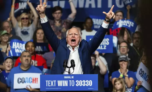 Democratic vice presidential nominee Minnesota Gov. Tim Walz speaks at a campaign rally, Saturday, Aug. 17, 2024, at The Astro in La Vista, Neb. (AP Photo/Bonnie Ryan)