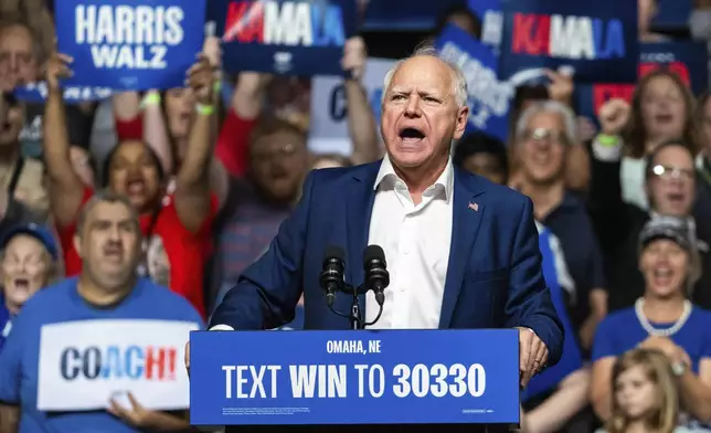 Democratic vice presidential nominee Minnesota Gov. Tim Walz speaks at a campaign rally, Saturday, Aug. 17, 2024, at The Astro in La Vista, Neb. (AP Photo/Bonnie Ryan)