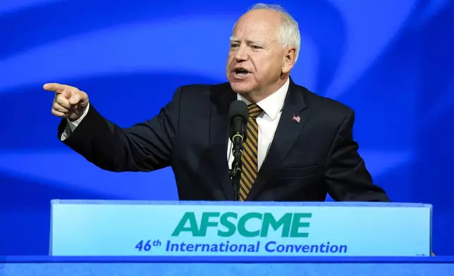 Democratic vice presidential nominee Minnesota Gov. Tim Walz speaks at the American Federation of State, County and Municipal Employees (AFSCME) Convention in Los Angeles, Tuesday, Aug. 13, 2024. (AP Photo/Jae C. Hong)