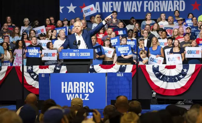 Democratic vice presidential nominee Minnesota Gov. Tim Walz speaks at a campaign rally, Saturday, Aug. 17, 2024, at The Astro in La Vista, Neb. (AP Photo/Bonnie Ryan)