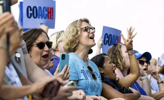 Supporters of Democratic vice presidential nominee Minnesota Gov. Tim Walz cheer after a campaign rally, Saturday, Aug. 17, 2024, at The Astro in La Vista, Neb. (AP Photo/Bonnie Ryan)