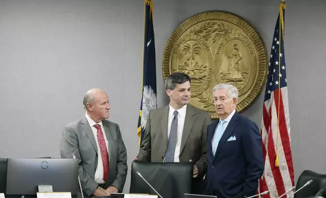 South Carolina Senate President Thomas Alexander, R-Walhalla, left; Senate Majority Leader Shane Massey, R-Edgefield, center; and Sen. Nikki Setlzer, D- West Columbia, right, speak before a South Carolina Senate committee planning to write a comprehensive energy bill in 2025 in Columbia, S.C., on Thursday, Aug. 22 2024. (AP Photo/Jeffrey Collins)