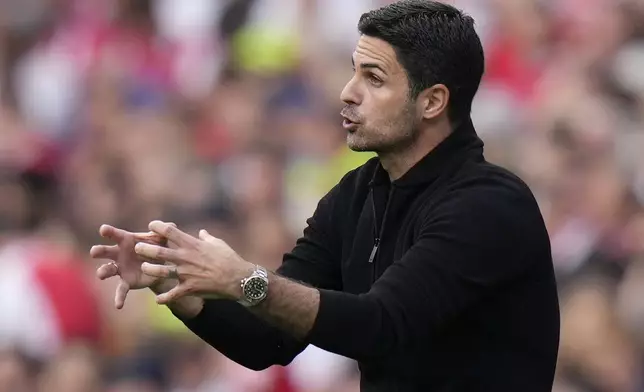 FILE - Arsenal's manager Mikel Arteta reacts during the English Premier League soccer match between Arsenal and Everton at the Emirates stadium in London, Sunday, May 19, 2024. (AP Photo/Alastair Grant)