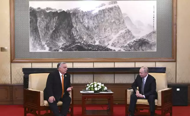 FILE - Russian President Vladimir Putin, right, listens to Hungarian Prime Minister Viktor Orban during their talks on the sidelines of the Belt and Road Forum in Beijing, China, on Tuesday, Oct. 17, 2023. (Grigory Sysoyev, Sputnik, Kremlin Pool Photo via AP, File)