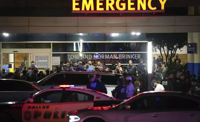 Dallas police gather at Methodist Dallas Medical Center early Friday, Aug. 30, 2024, in Dallas. (Smiley N. Pool/The Dallas Morning News via AP)